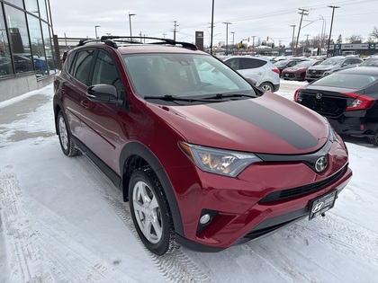 used 2018 Toyota RAV4 car, priced at $27,599