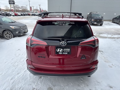 used 2018 Toyota RAV4 car, priced at $27,599