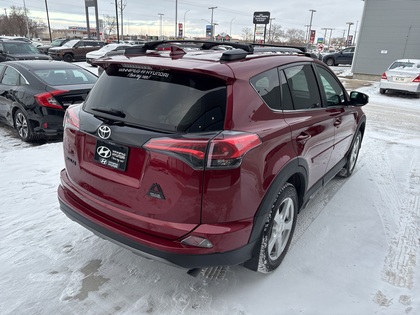 used 2018 Toyota RAV4 car, priced at $27,599