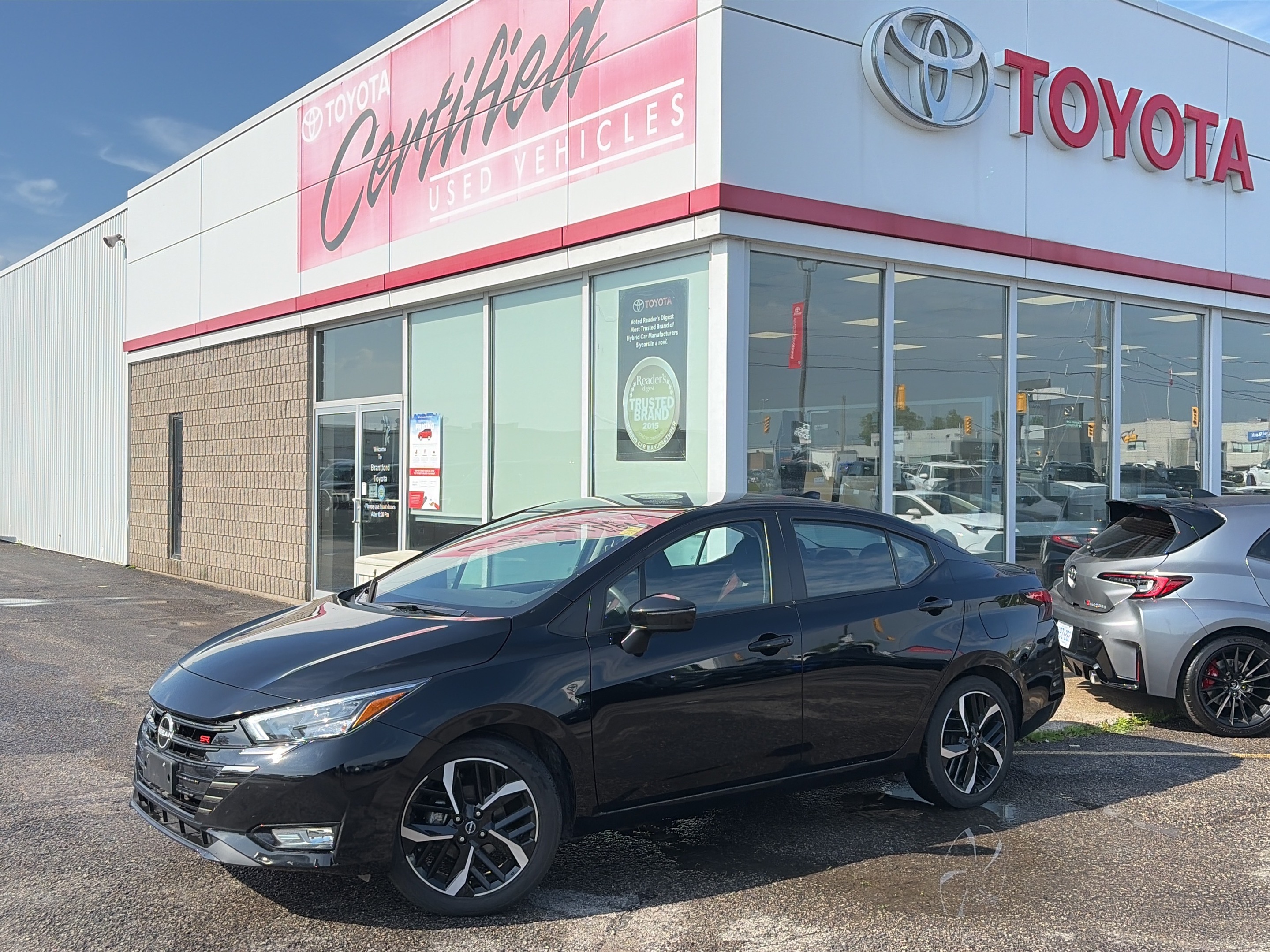 Black 2024 Nissan Versa Sedan Front-Wheel Drive Automatic