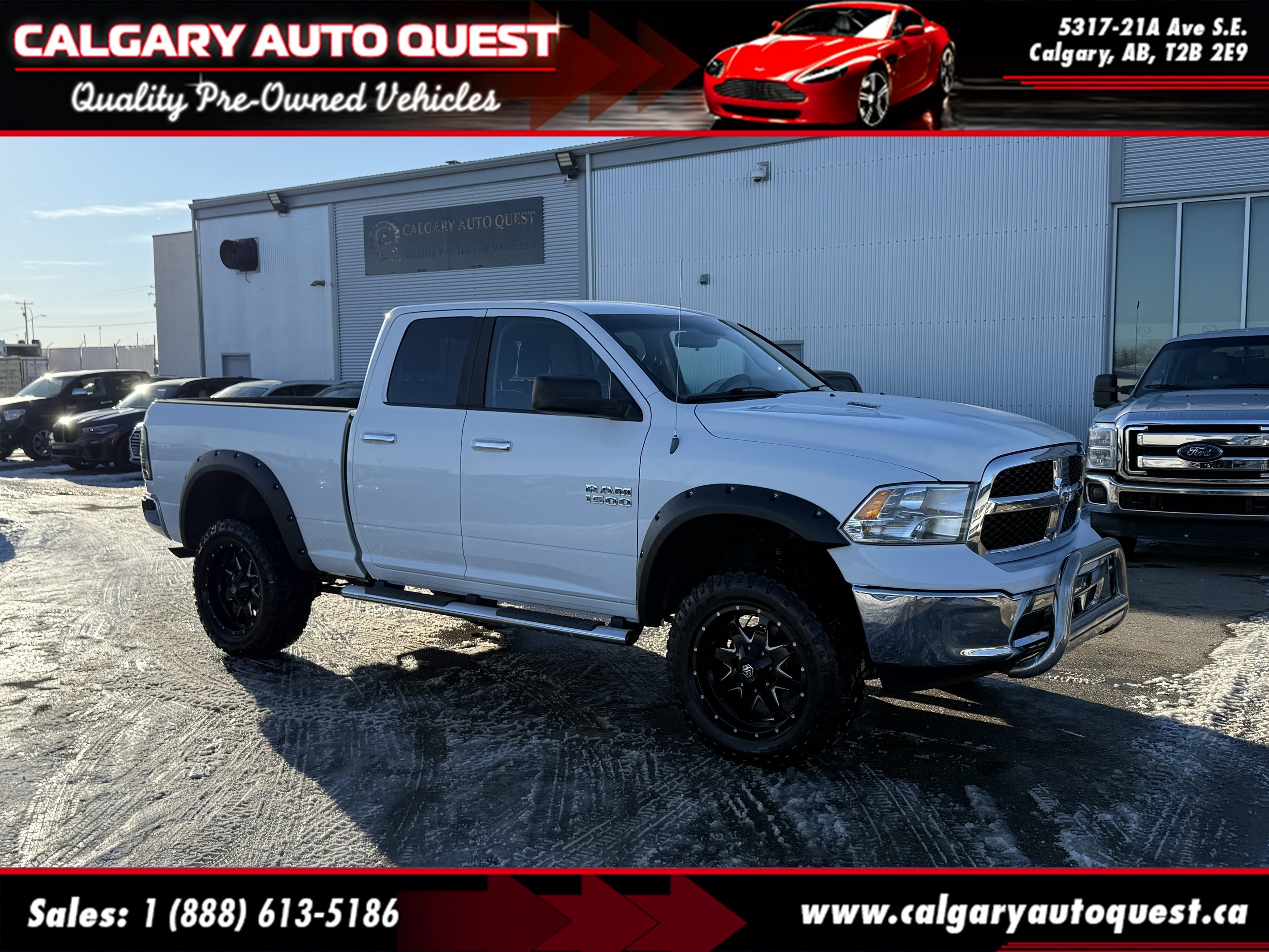 2013 Ram 1500 4WD Quad Cab 140.5  SLT LIFTED // MUST SEE