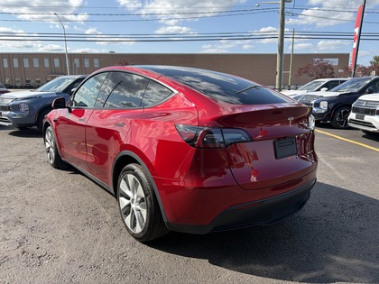 used 2024 Tesla Model Y car, priced at $46,950