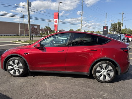 used 2024 Tesla Model Y car, priced at $46,950