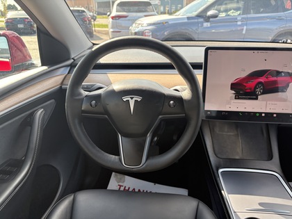 used 2024 Tesla Model Y car, priced at $46,950