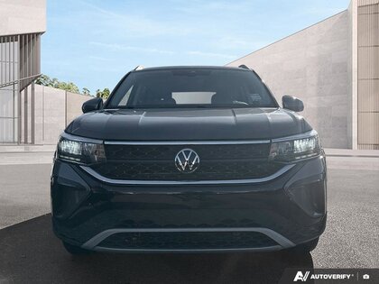 used 2024 Volkswagen Taos car, priced at $24,700