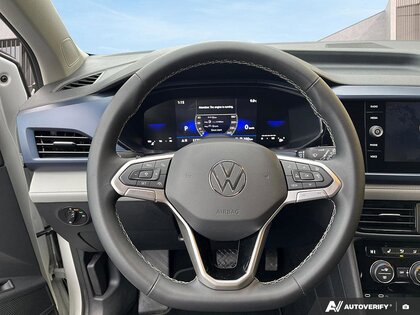 used 2024 Volkswagen Taos car, priced at $24,100