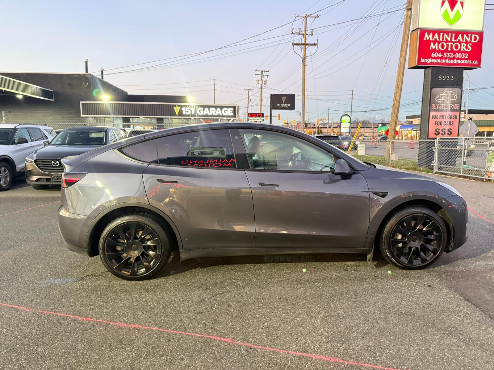 2023 Tesla Model Y — view 3