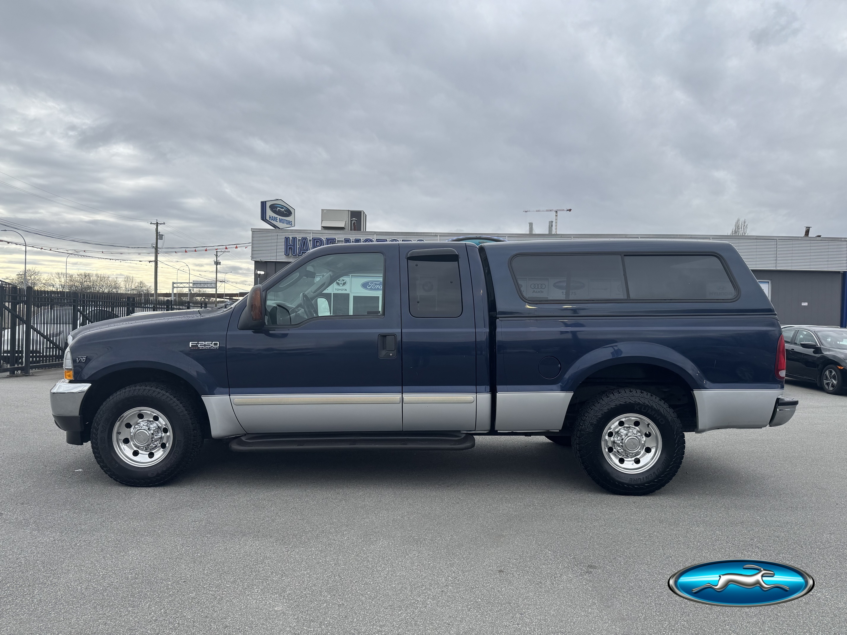 Blue 2003 Ford F-250 Super Duty XL SuperCab SB Pickup Truck Rear-Wheel Drive 6-Speed Manual