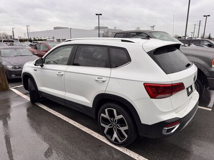 used 2023 Volkswagen Taos car, priced at $27,494