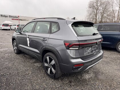 used 2025 Volkswagen Taos car, priced at $31,600