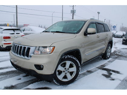 Gold 2012 Jeep Grand Cherokee Laredo 4WD SUV / Crossover Four-Wheel Drive Automatic