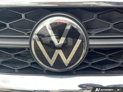 used 2024 Volkswagen Taos car, priced at $23,300