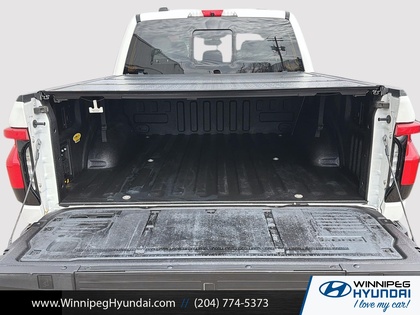 used 2022 Ford F-150 Lightning car, priced at $64,950