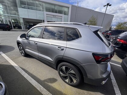 used 2025 Volkswagen Taos car, priced at $33,770