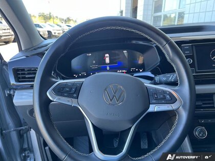 used 2024 Volkswagen Taos car, priced at $22,822
