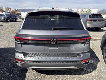 used 2025 Volkswagen Taos car, priced at $38,275