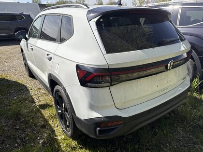 used 2025 Volkswagen Taos car, priced at $36,875