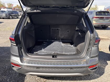 used 2025 Volkswagen Taos car, priced at $38,275