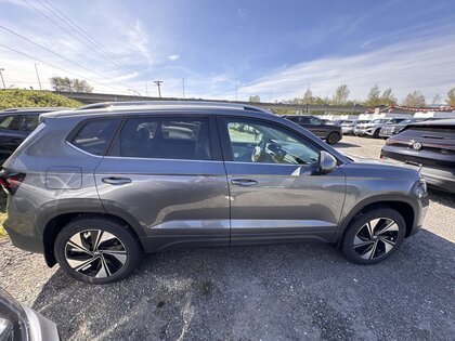 used 2025 Volkswagen Taos car, priced at $38,275