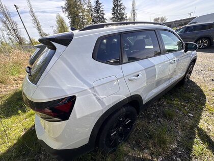 used 2025 Volkswagen Taos car, priced at $36,875