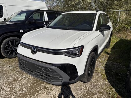 used 2025 Volkswagen Taos car, priced at $36,875