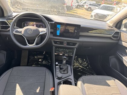 used 2025 Volkswagen Taos car, priced at $36,875