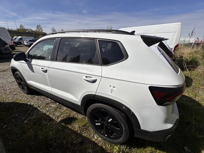 used 2025 Volkswagen Taos car, priced at $36,875