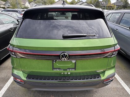 used 2025 Volkswagen Taos car, priced at $37,270