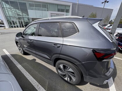 used 2025 Volkswagen Taos car, priced at $34,570