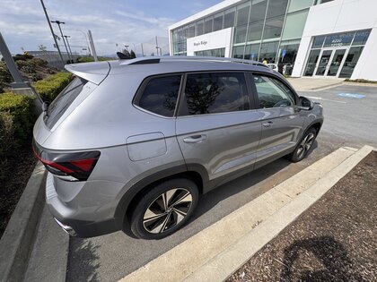used 2025 Volkswagen Taos car, priced at $34,480
