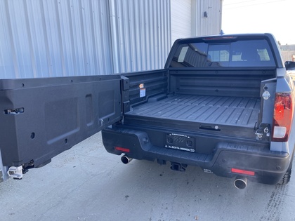 used 2025 Honda Ridgeline car, priced at $49,900