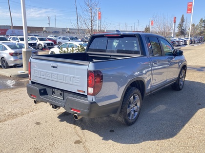 used 2025 Honda Ridgeline car, priced at $49,900