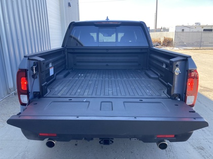 used 2025 Honda Ridgeline car, priced at $49,900