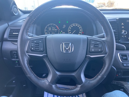 used 2025 Honda Ridgeline car, priced at $49,900