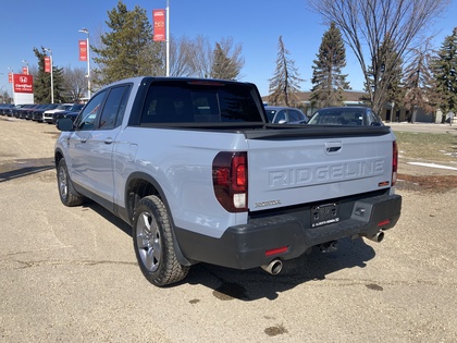 used 2025 Honda Ridgeline car, priced at $49,900