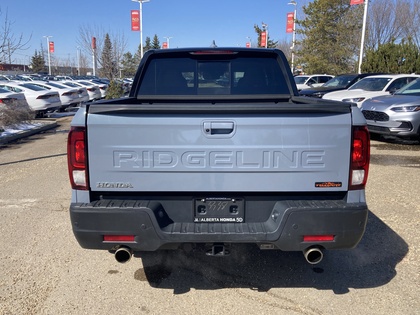 used 2025 Honda Ridgeline car, priced at $49,900