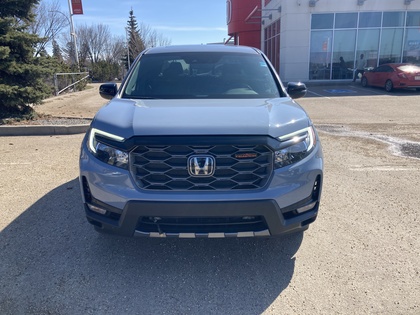 used 2025 Honda Ridgeline car, priced at $49,900