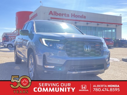 used 2025 Honda Ridgeline car, priced at $49,900