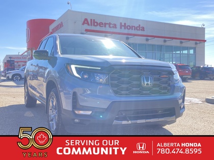 used 2025 Honda Ridgeline car, priced at $49,900