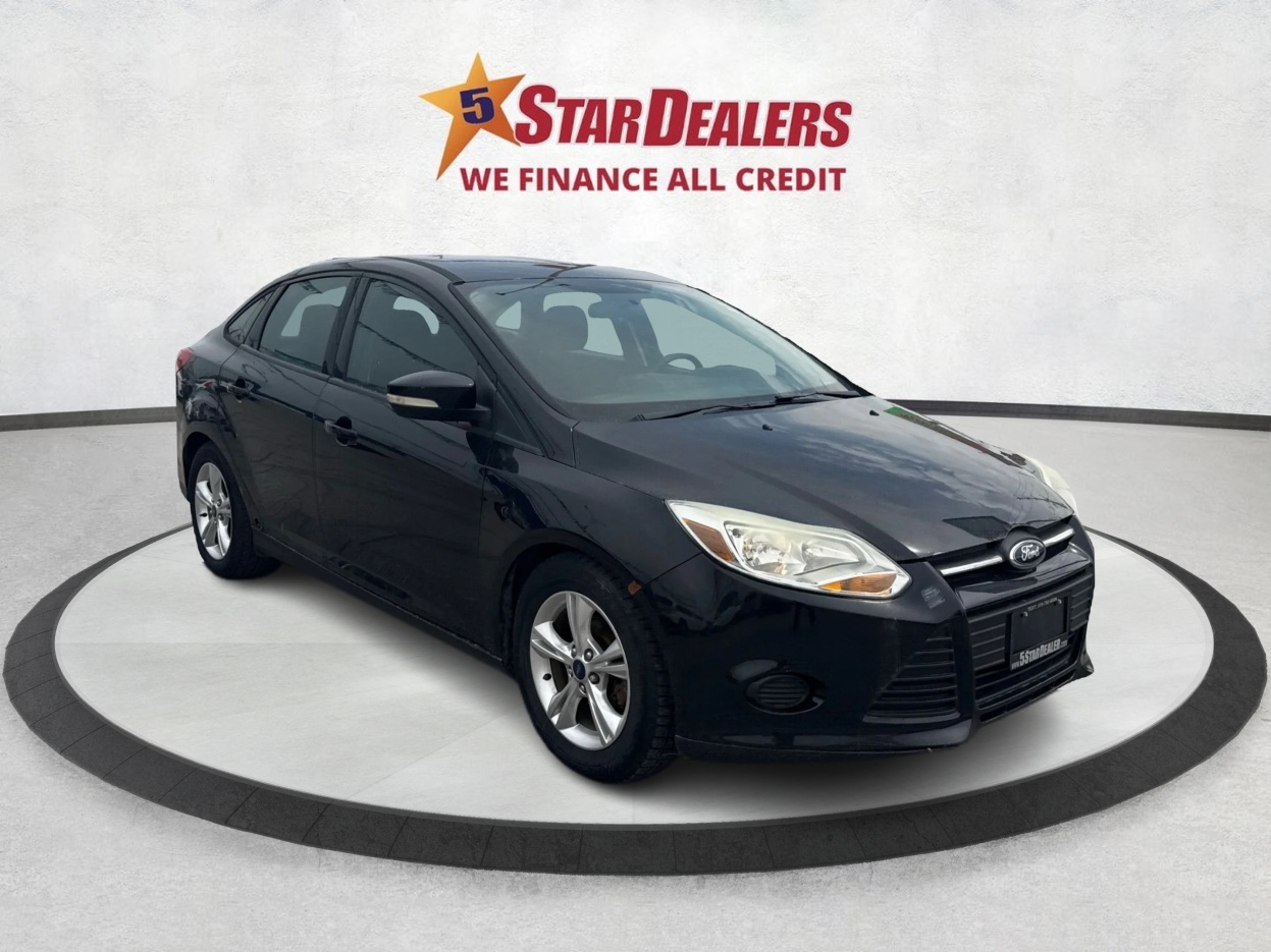 Black 2014 Ford Focus SE Sedan Front-Wheel Drive 5-Speed Manual