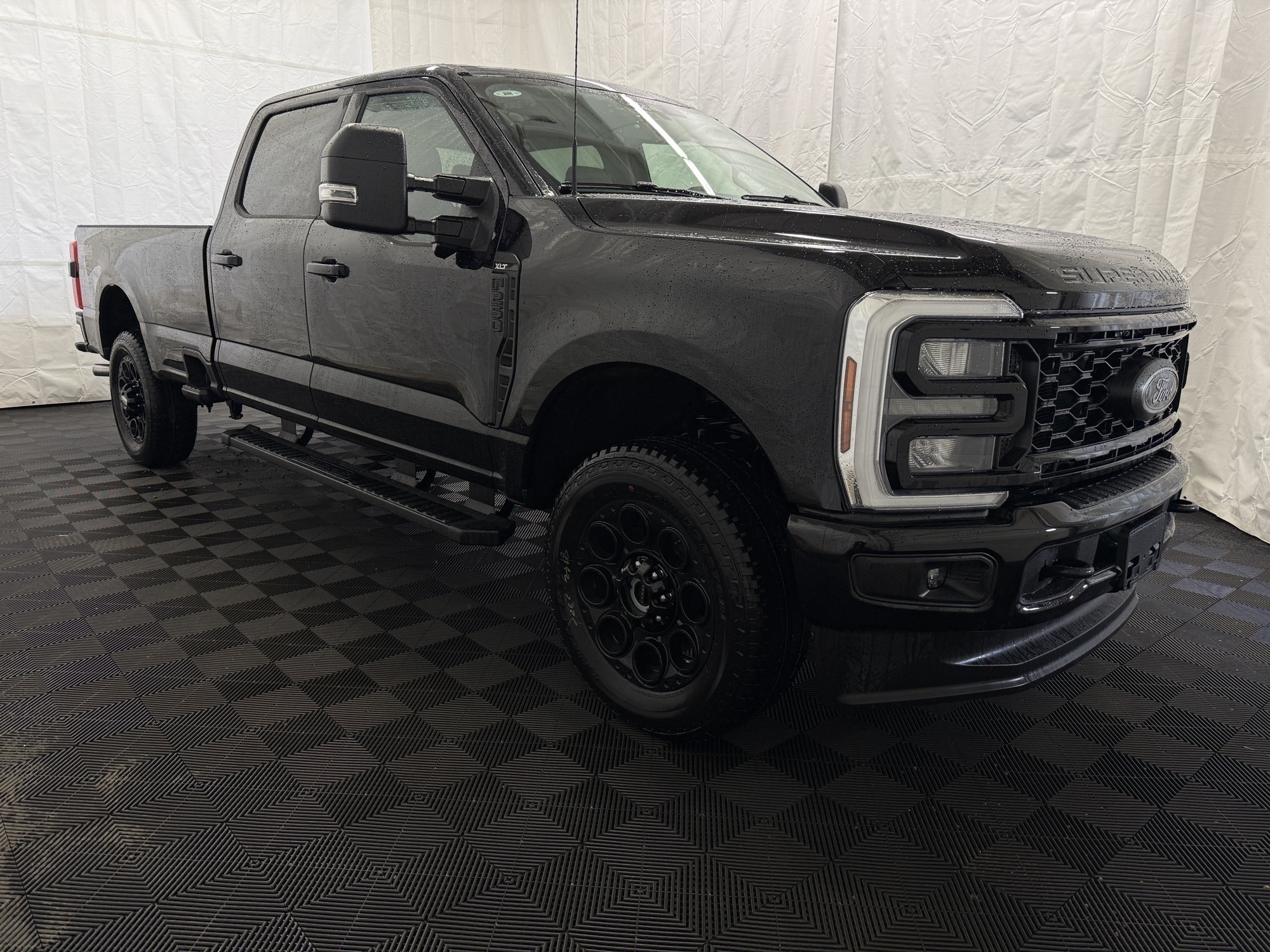 Black 2026 Ford F-250 Super Duty XLT Crew Cab 4WD Pickup Truck Four-Wheel Drive Automatic