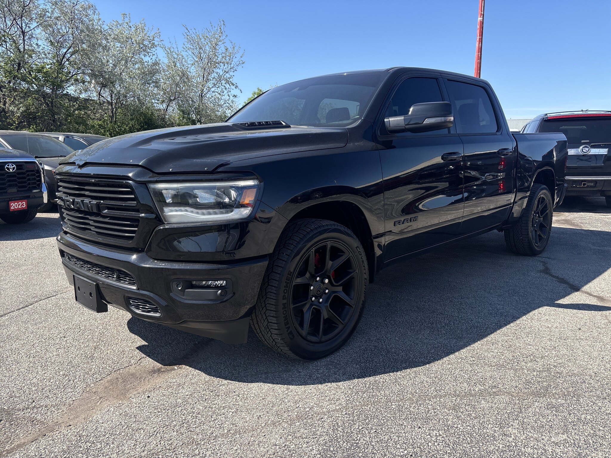 2023 RAM 1500 Sport 4x4 Crew Cab 5'7" Box Truck