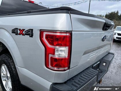 used 2018 Ford F-150 car, priced at $26,900