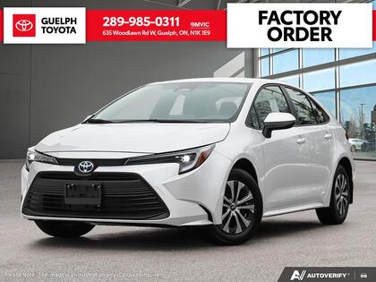 White 2026 Toyota Corolla Hybrid Sedan All-Wheel Drive
