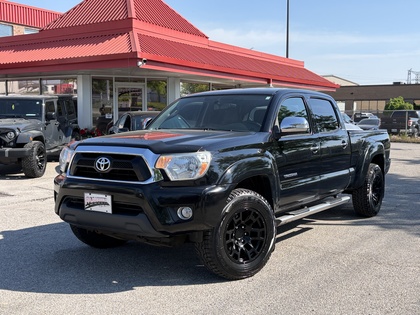 Black 2013 Toyota Tacoma Double Cab SB V6 4WD Pickup Truck Four-Wheel Drive 5-Speed Automatic