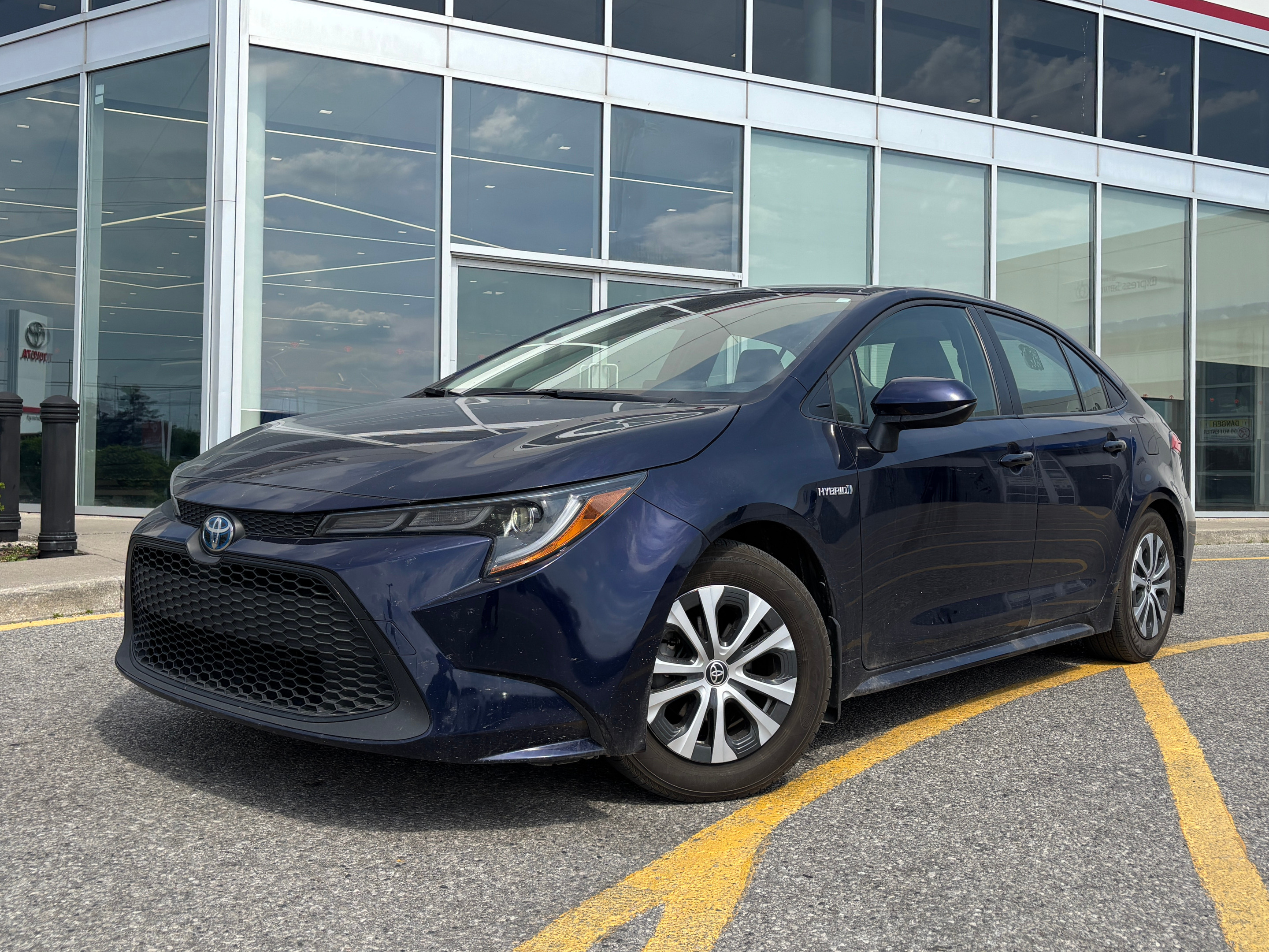 Blue 2021 Toyota Corolla Hybrid FWD Sedan Continuously Variable Transmission