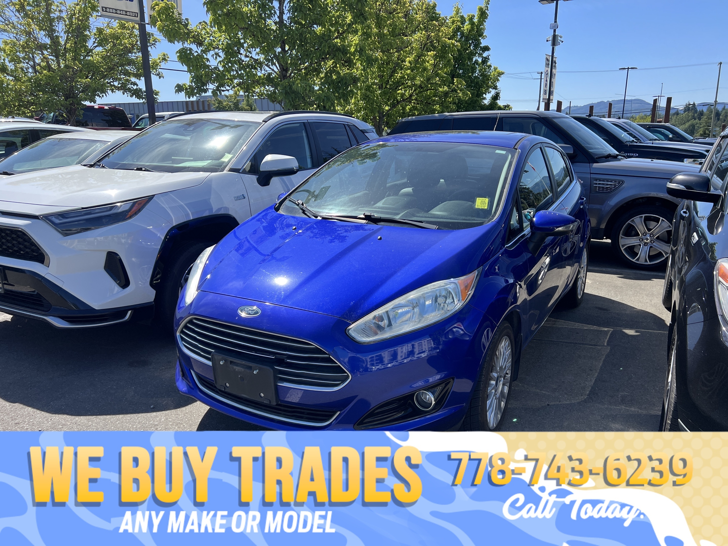 Blue 2014 Ford Fiesta Titanium Hatchback Hatchback Front-Wheel Drive Automatic