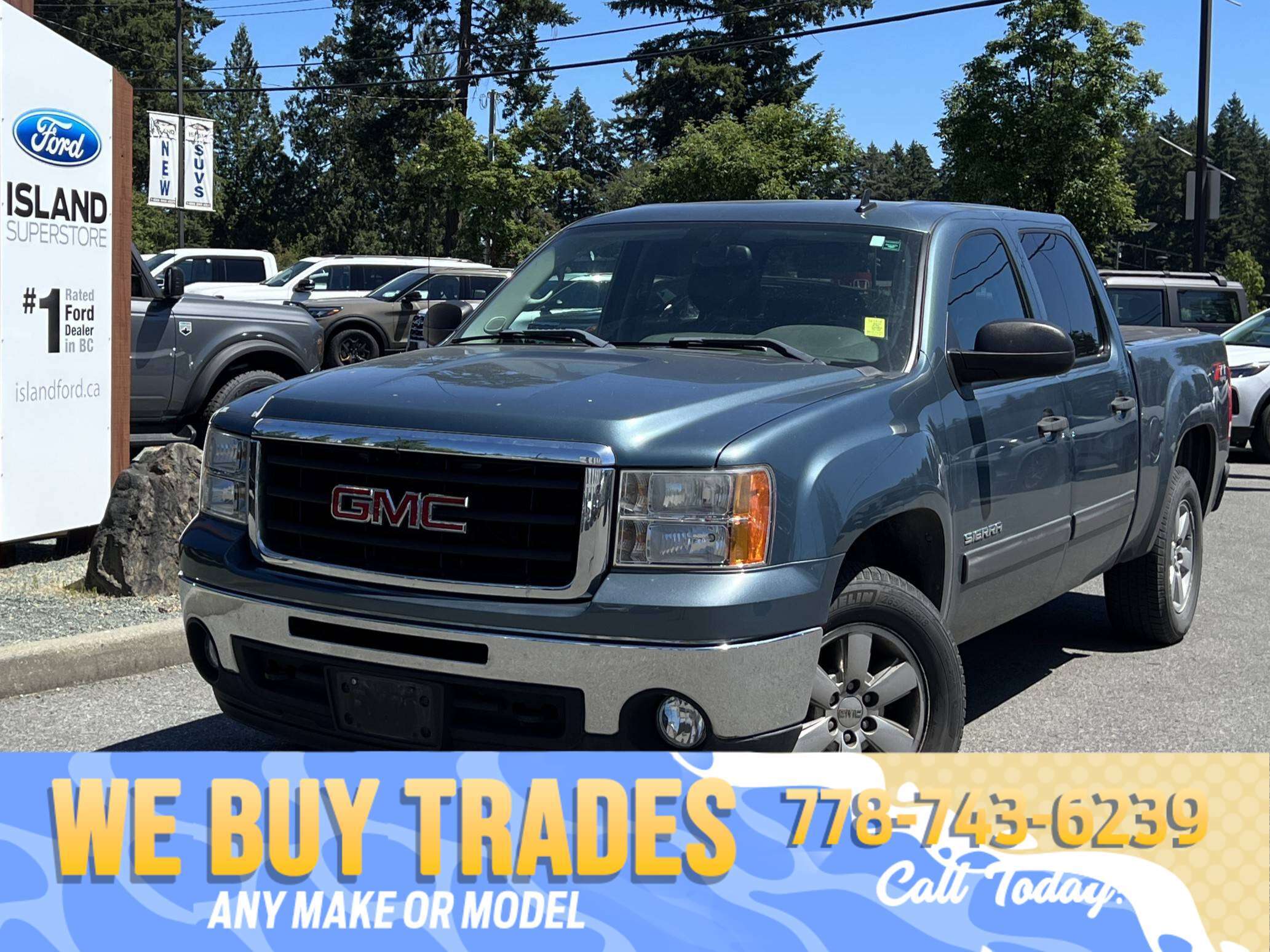 Blue 2010 GMC Sierra 1500 Pickup Truck Four-Wheel Drive Automatic