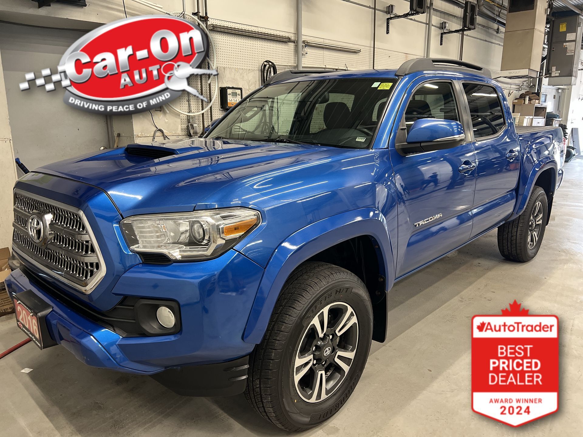 Blue 2016 Toyota Tacoma Pickup Truck Four-Wheel Drive Manual