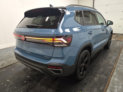 used 2025 Volkswagen Taos car, priced at $33,179